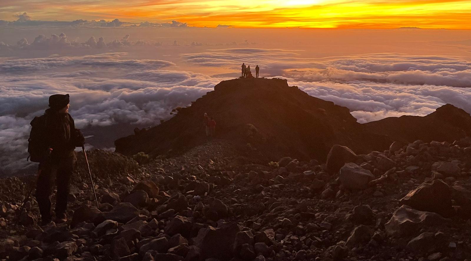 Sunrise above the clouds on Mount Rinjani